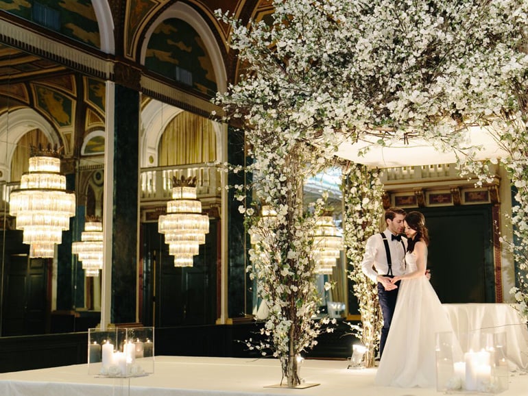 A bride and groom in one of Fairmont Royal York's elegant wedding venues in downtown Toronto.