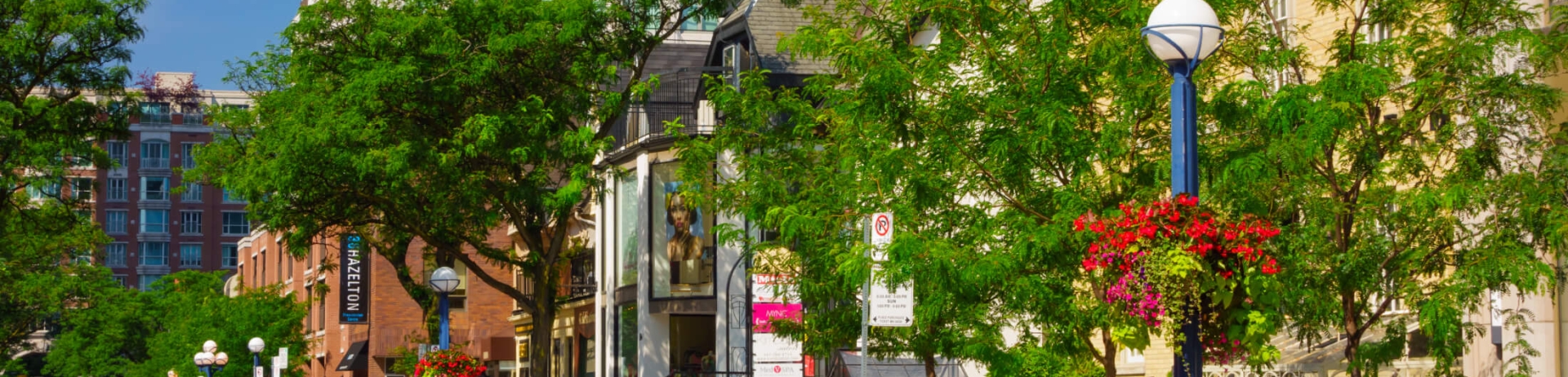 Cars driving along Bloor and Yorkville