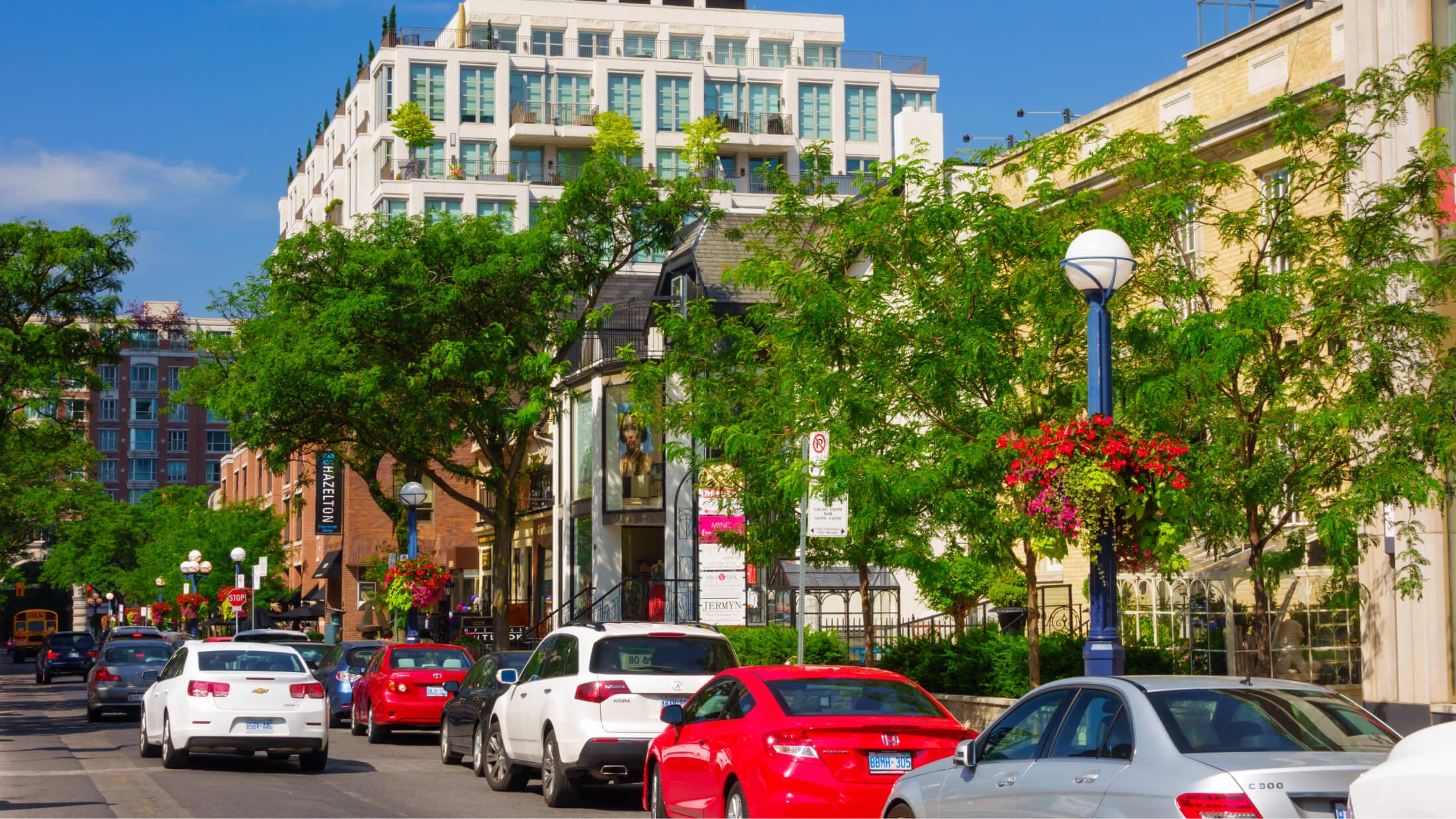 Cars driving along Bloor and Yorkville