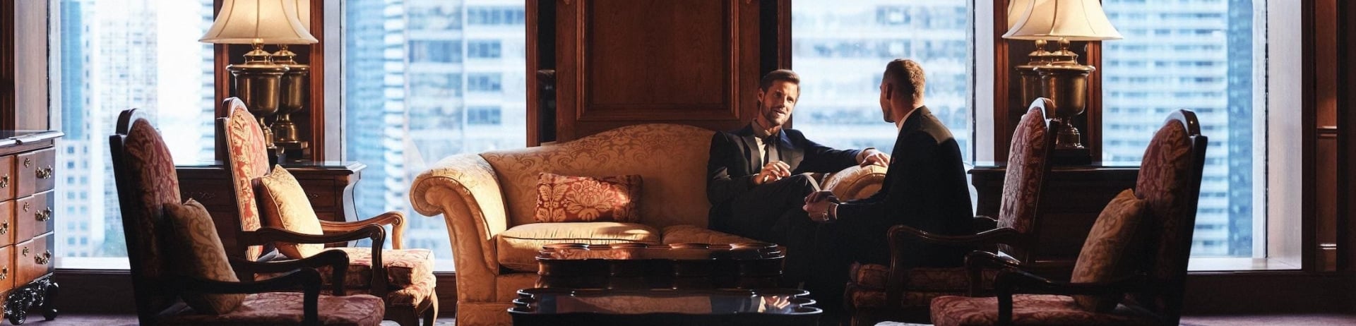 Two men sitting in Fairmont Royal York Hotel's 19th Floor meeting space.