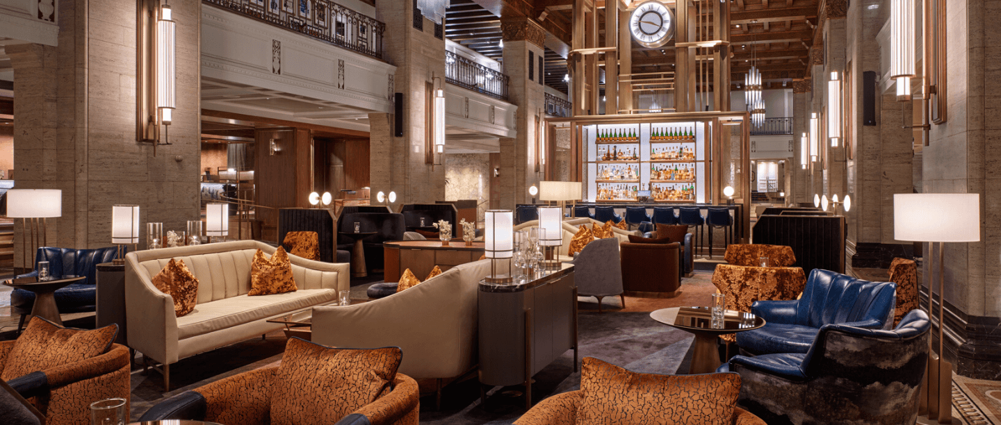 Sofas and chairs at Fairmont Royal York's lobby lounge, Clockwork.