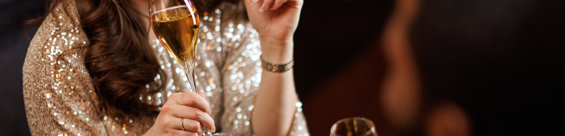 A couple toasting with champagne.